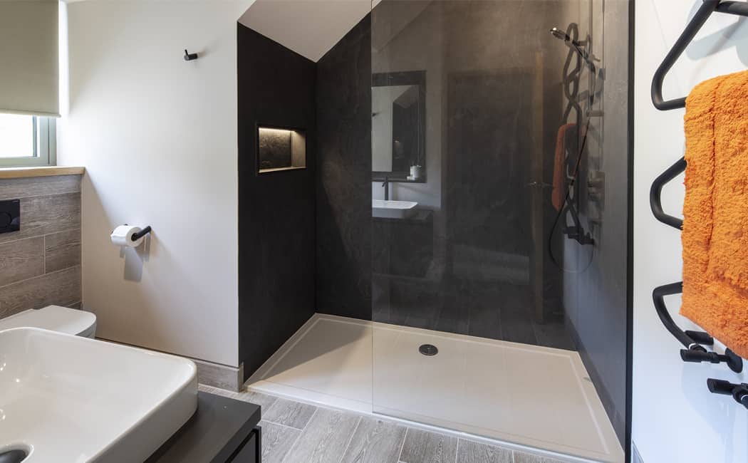15 Textural Slate Finish Shower Area with Quirky Towel Rail